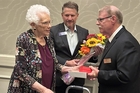 Mary Jean Etten is honored by Empath Health-Stratum representatives.