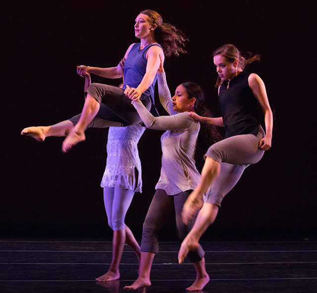 Dance students performing a group choreography.