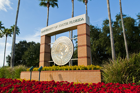 Front of Campus Entrance with USF Seal Sign