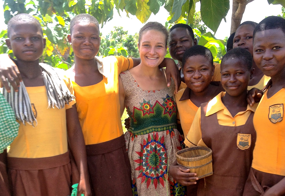 Peace Corps Recruiter Kristen Vogel with students in Ghana.