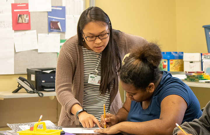 USF teacher candidate instructing student in local school