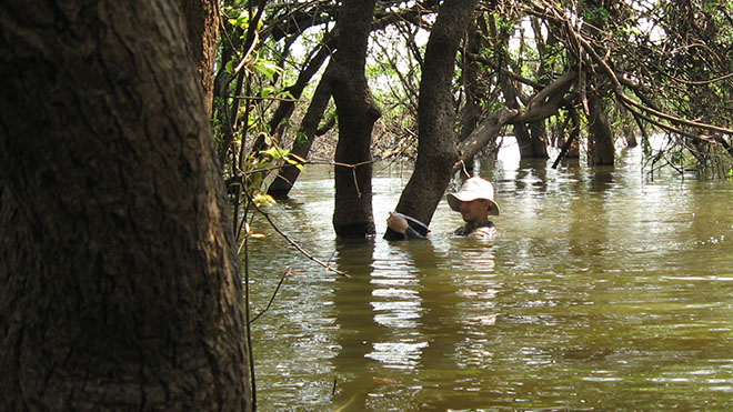 Mauricio Arias taking water samples in Cambodia