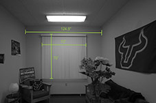 Dimensions of common room area - wall is 10 feet and 3 inches wide. Window blinds are 72 inches wide by 70 inches tall.