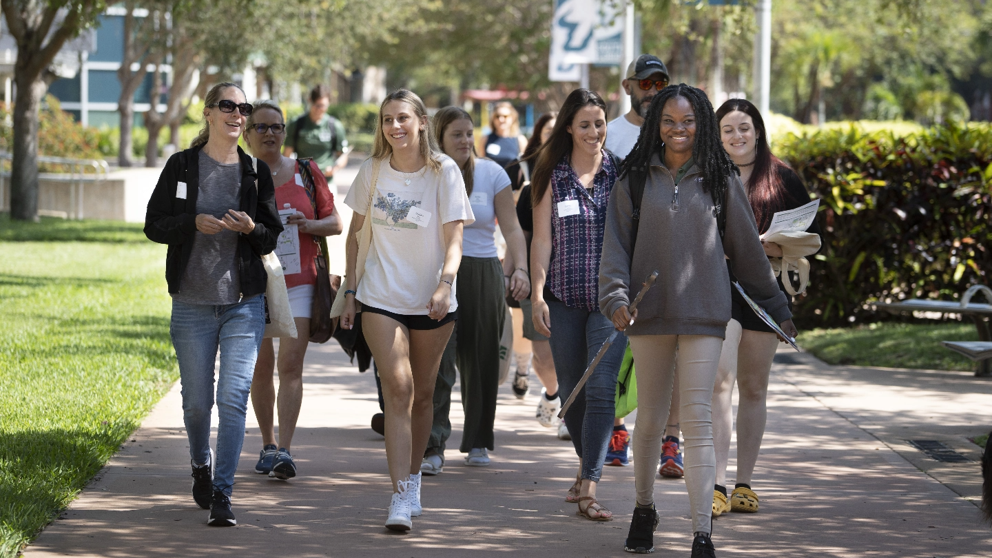 USF students walking on campus during their orientation.