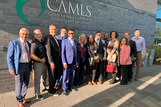 group shot of the Canada-Florida Chamber of Commerce with representatives from USF at CAMLS in downtown Tampa, FL