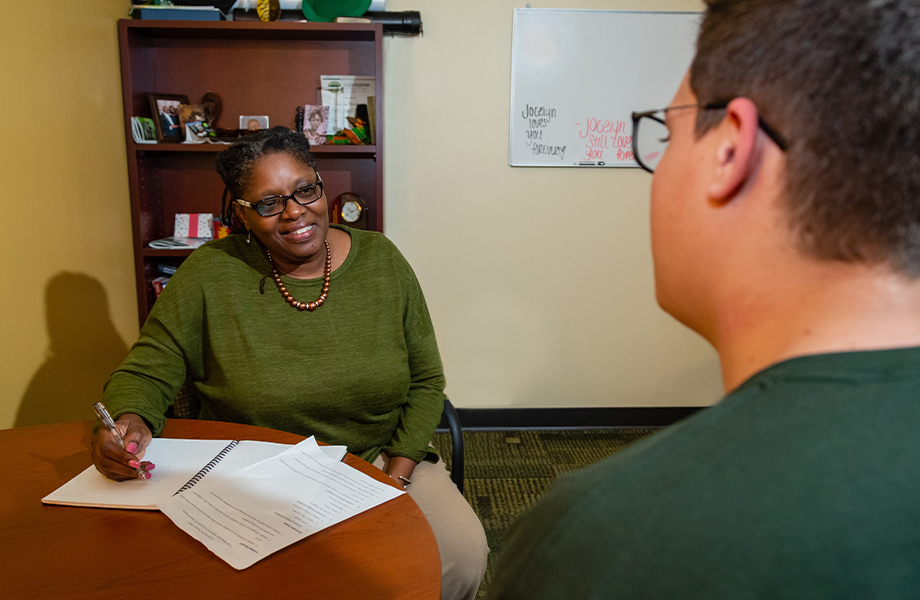 A college counselor helping her student.