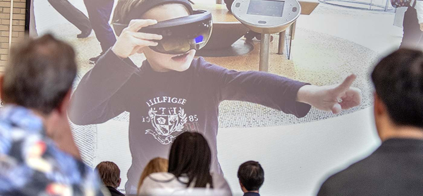 University of South Florida staff and faculty listen to presentations about interdisciplinary research.