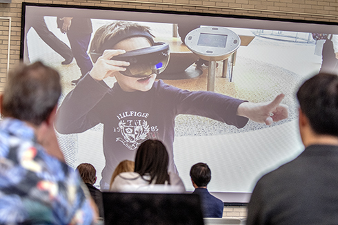 University of South Florida staff and faculty listen to presentations about interdisciplinary research.