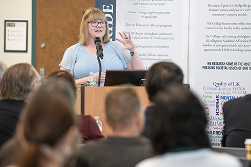 Julia Woodward, an assistant professor in the Bellini College of Artificial Intelligence, Cybersecurity and Computing, discussed work with augmented reality headset interfaces and how experiences should be designed differently for adults and children.