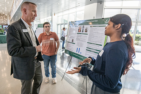 discussing research posters