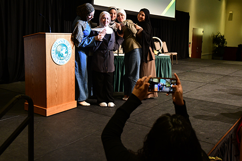 Bellini graduates taking photos
