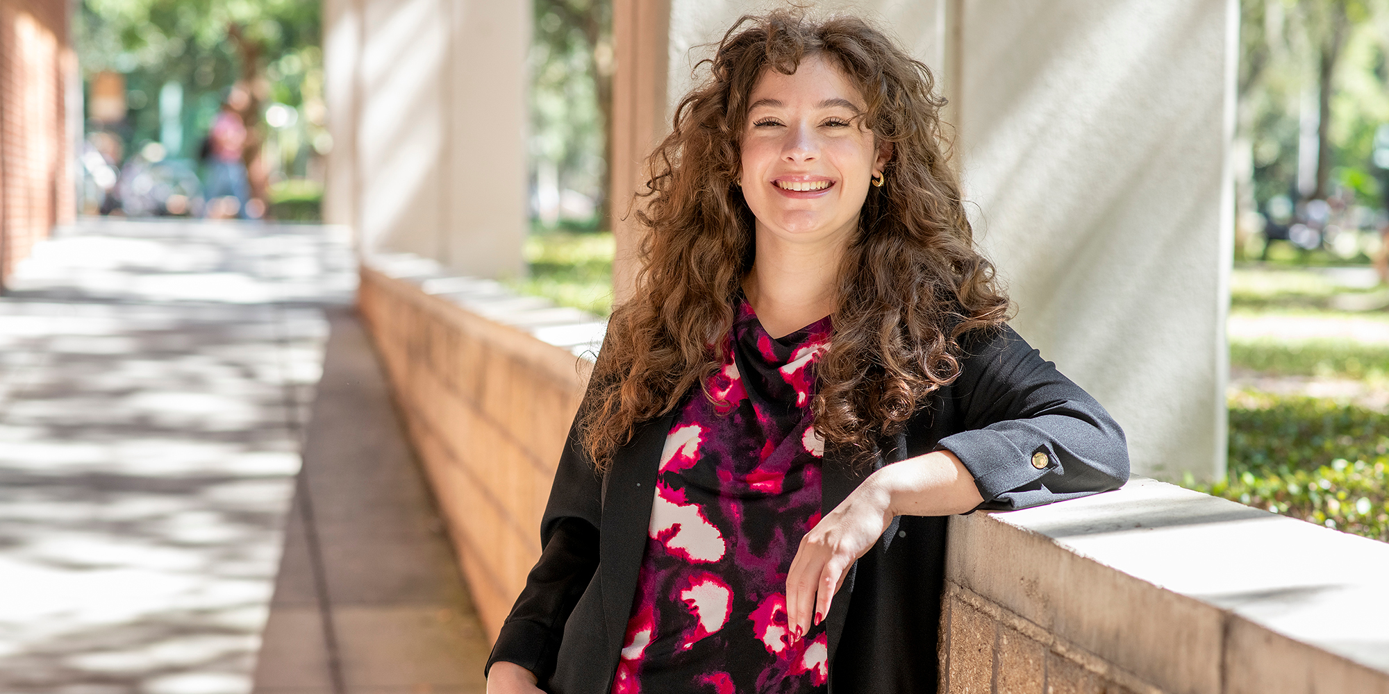 As a student at USF’s Bellini College, Mackenzie Freel is determined to help other women find the same sense of belonging that she found in cybersecurity. Photo by Jeremy Maready