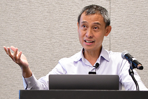 Simon Ou, professor and director of the Rapid7 Cyber Threat Intelligence Lab at USF’s Bellini College presenting at CyberBay 2025.