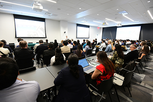 The AI+X Symposium brought together about 200 experts from fields including medicine, cybersecurity, engineering, business, education and the sciences.