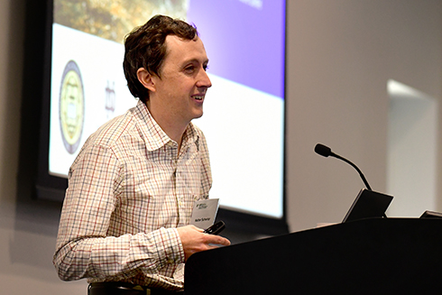 Walter Scheirer gives his presentation during the symposium.