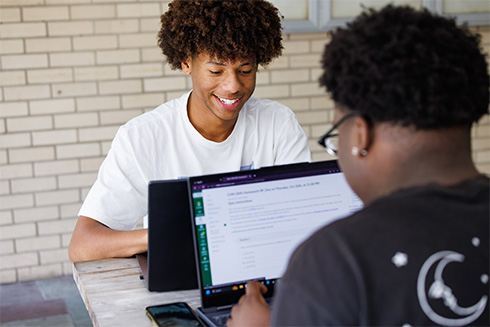 University of South Florida students working laptop computers
