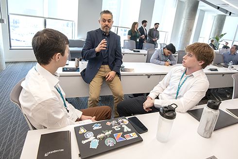 Students listen to one of the ReliaQuest mentors during the ReliaQuest Labs program.
