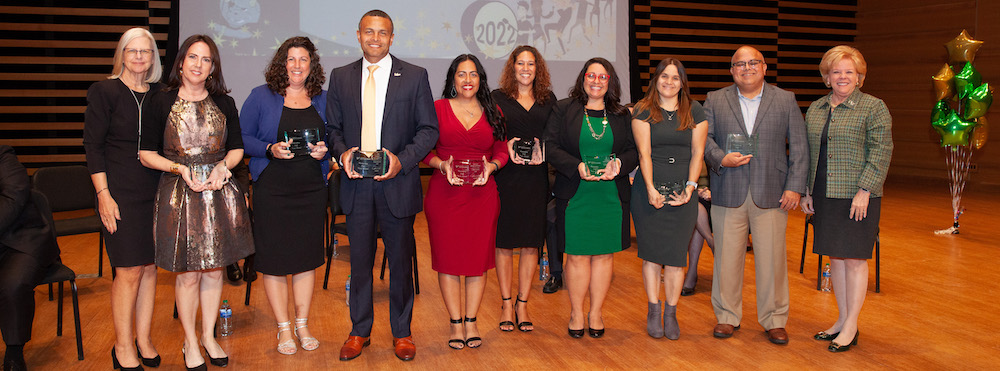 Alianza-Latina Faculty & Staff Association Executive Board receiving a 2022 USF Outstanding Staff Award