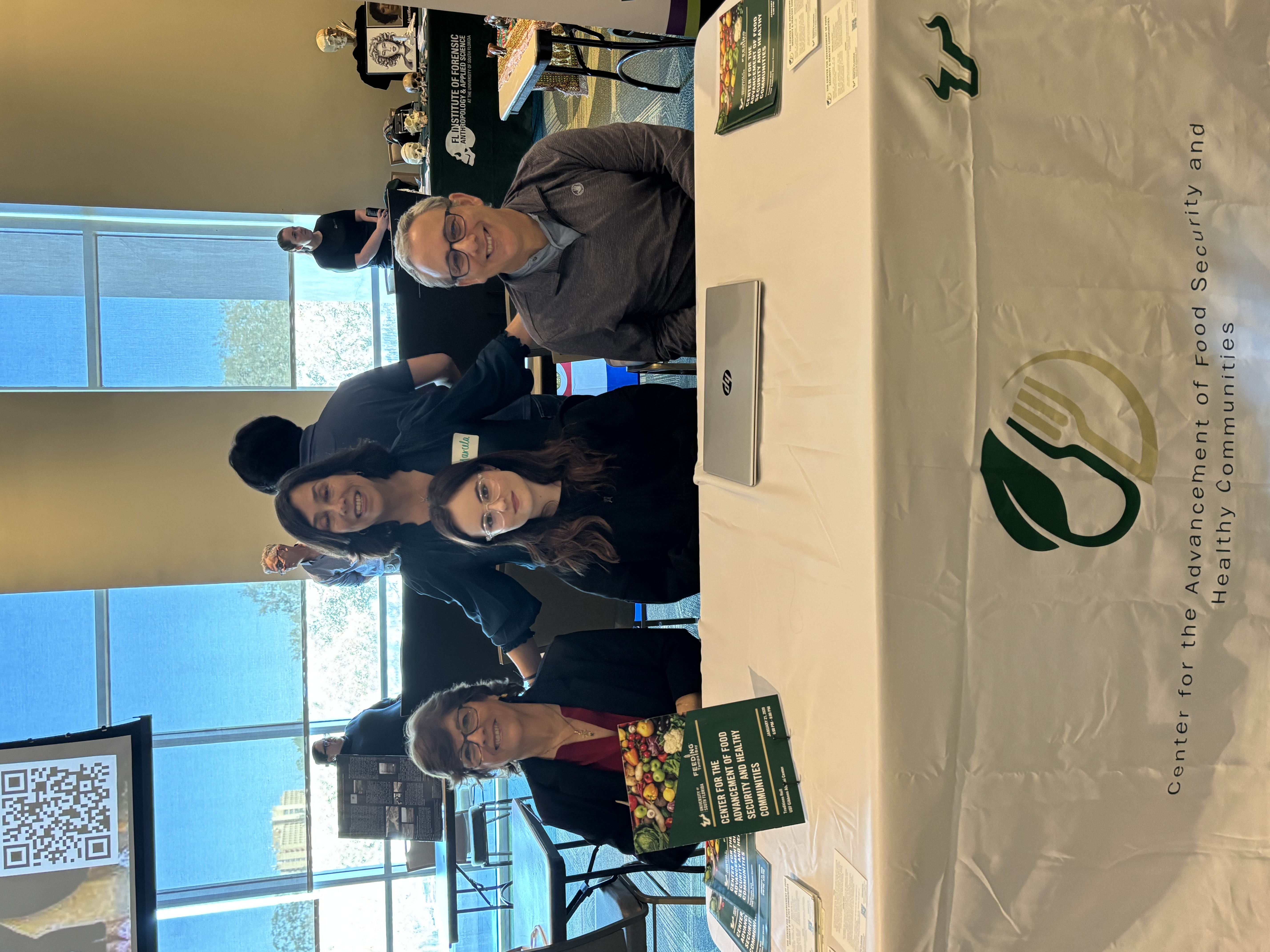 Employees at CAFSHC sit around a table