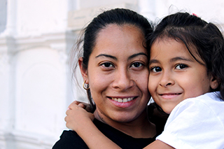 immigrant woman and child