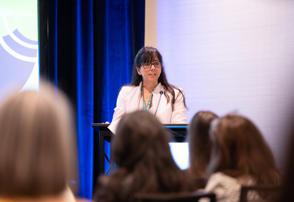 Center Director Dr. Elizabeth Aranda gives introductory remarks at the IWB 2025 conference in St. Petersburg, Florida on February 14, 2025.