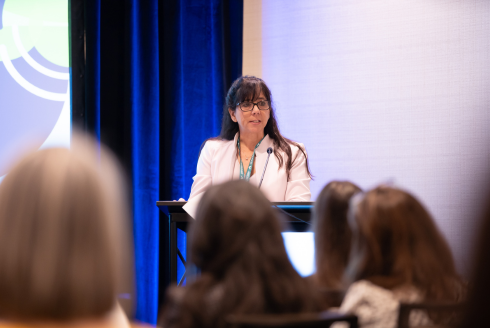 Center Director Dr. Elizabeth Aranda gives introductory remarks at the IWB 2025 conference in St. Petersburg, Florida on February 14, 2025.