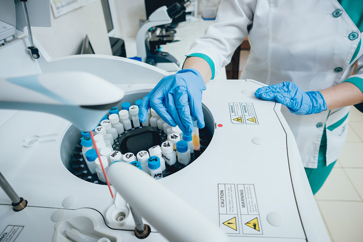 scientist working with test tubes