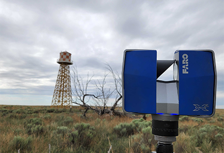 equipment set up in front of water tower