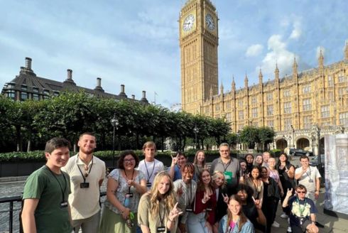 Director Scott Solomon, and students, standing outside of the Parliament building in London. (Photo courtesy of Elena Efremova)