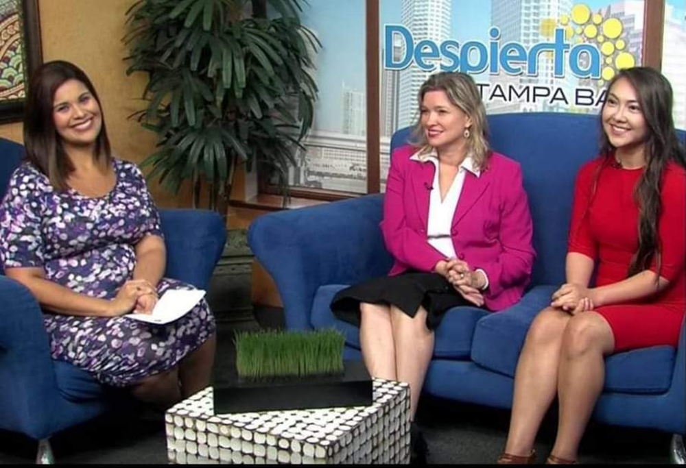 Rodriguez-Rogers (middle) and her mentee Yoana Cardoso (right), being featured on the Latin broadcast channel Despierta Tampa Bay with news anchor Sarykarmen Rivera (left). (Photo courtesy of Aileen Rodriguez-Rogers)