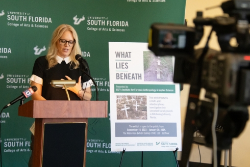 Dr. Erin Kimmerle speaks to members of the media the exhibit’s opening event. (Photo by Corey Lepak)