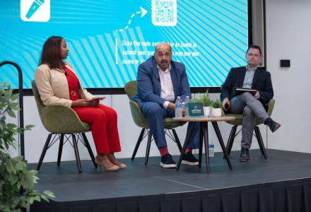 Kaylor Smith, student, (left), and Dr. Joshua Scacco, associate professor in the Department of Communication, (right), lead a Q & A session with Dr. Vaidhyanathan. (Photo by Corey Lepak)