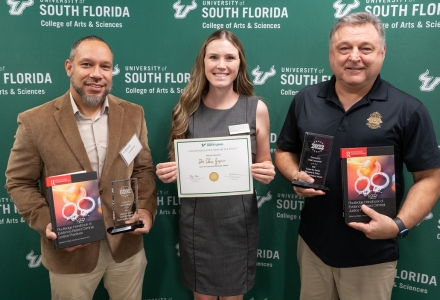 (From left) Freddy Barton, executive director of Safe & Sound Hillsborough; Dr. Chae Jaynes, associate professor of criminology; and Paul Lusczynski, former captain of the Tampa Police Department. (Photo by Corey Lepak)