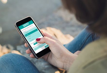 person views survey on a mobile phone (Adobe stock photo)