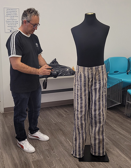 3D digitization via digital photogrammetry of a concentration camp prisoner’s striped uniform donated to the HDEC by a survivor. (Photo courtesy of Dr. Davide Tanasi)
