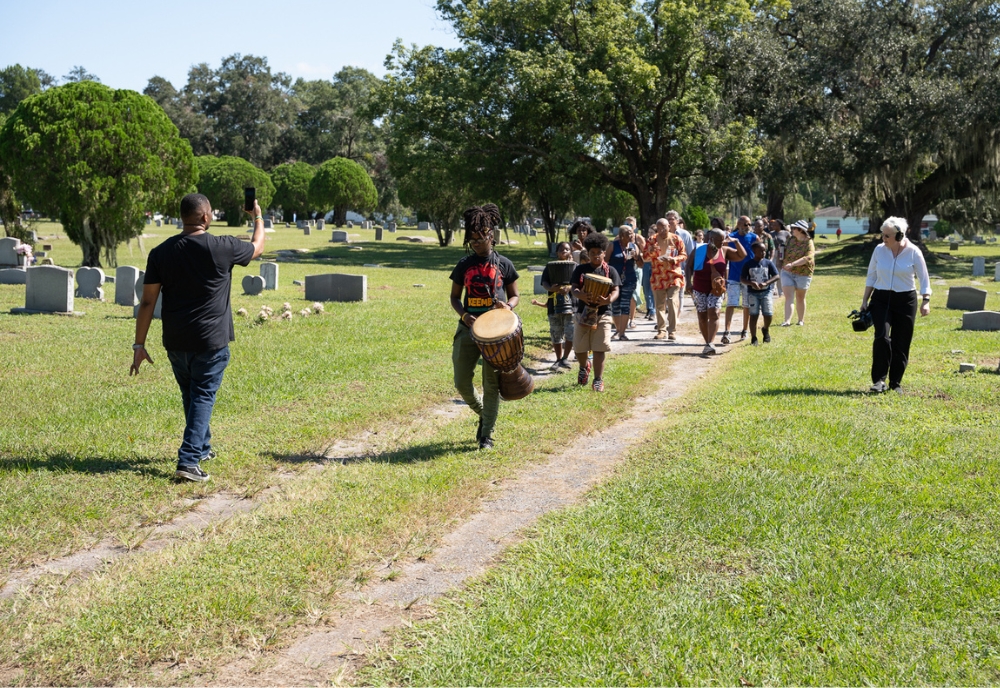 The USF Living Heritage Institute’s Black Cemetery Network welcomed the community to pay tribute to those buried in Tampa’s historical Memorial Park Cemetery. (Photo by Corey Lepak)