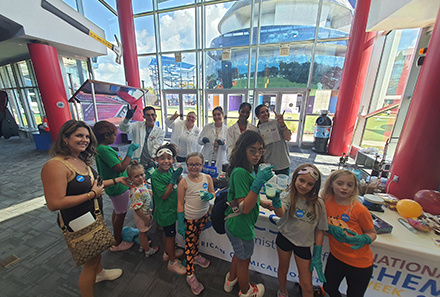Parents and children participating in the free experiment at MOSI. (Photo courtesy of Dr. Christie Tang)