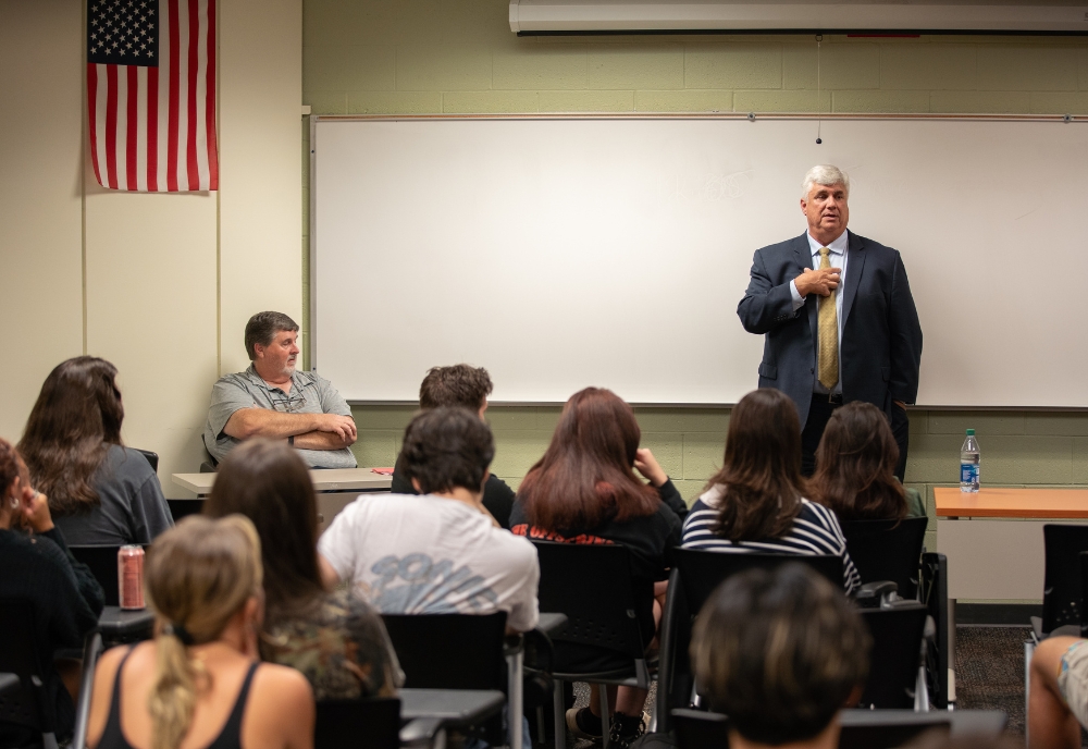 State prosecutor, Nicholas B. Cox, presenting at the Bulls in Action alumni speaker series. (Photo by Corey Lepak)