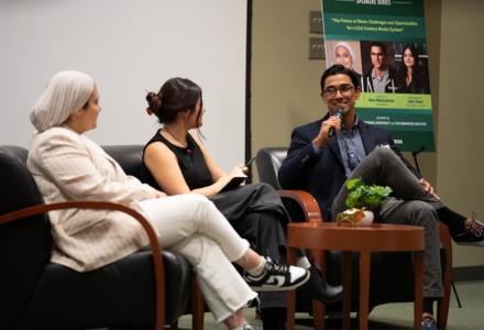 Alex Mahadeven (right) talks with Julia Saad (left) and Aya Diab (middle) (Photo by Corey Lepak)