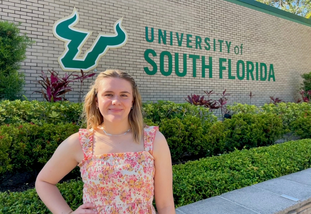 Zimmerman School senior, Gracie Glover, outside of the Office of Admissions building on the USF Tampa campus. (Photo courtesy of Gracie Glover)