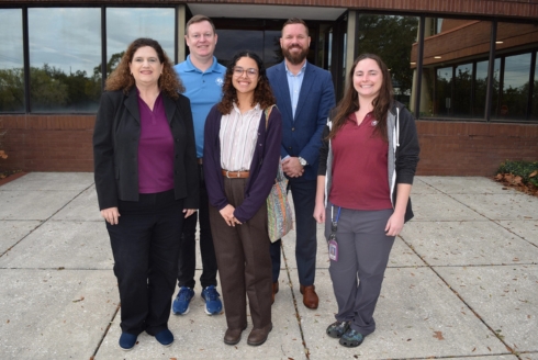 (From left, first row) Elaine DeLeeuw, administration director; Evalyse Sanabria, GIS intern; Abbie Weeks, wetlands scientist. (From left, back row) Chris Boland, GIS administrator; Michael Lynch, wetlands director. (Photo courtesy of Evalyse Sanabria)