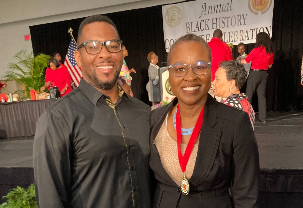 AABGP team members Walter “Wally B.” Jennings (left) and Dr. Antoinette Jackson (right) accept the award on behalf of the team during the City of Tampa’s annual Black History Celebration. (Photo courtesy of Dr. Jackson)