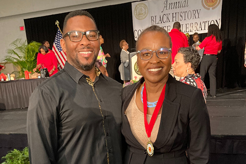 AABGP team members Walter “Wally B.” Jennings (left) and Dr. Antoinette Jackson (right) accept the award on behalf of the team during the City of Tampa’s annual Black History Celebration. (Photo courtesy of Dr. Jackson)
