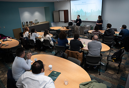 Dr. Joshua Scacco presenting to the participants of the Journalism & Democracy Program held at the University of South Florida. (Photo by Corey Lepak)