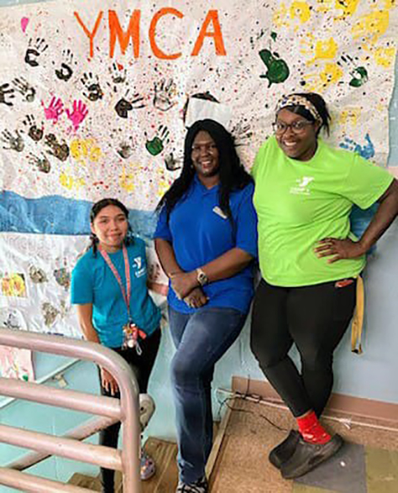 Mojisola Adewumi (center) and her co-workers at the Upper Keys YMCA Program center. (Photo courtesy of Mojisola Adewumi)