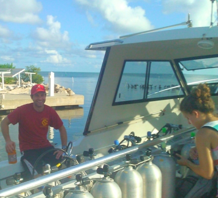 Chris Witowski (left) and Jackie von Salm (right) preparing for scuba diving research in the Florida Keys in 2013. (Photo courtesy of Jackie von Salm)
