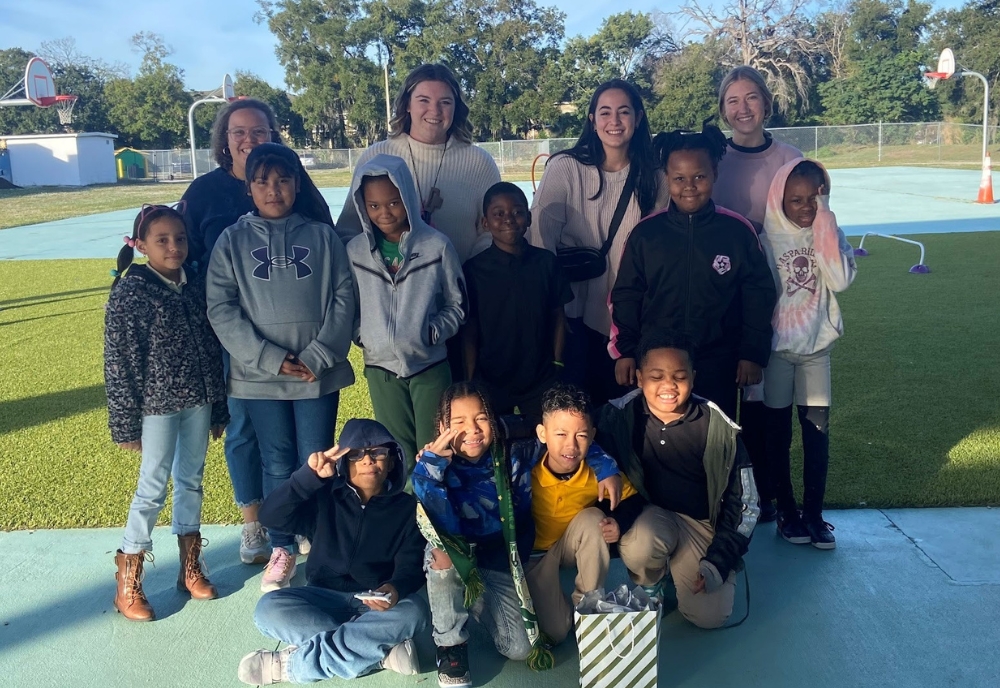 The P.E. students at James Elementary School with Jenna Capuano. (Photo courtesy of Jenna Capuano)