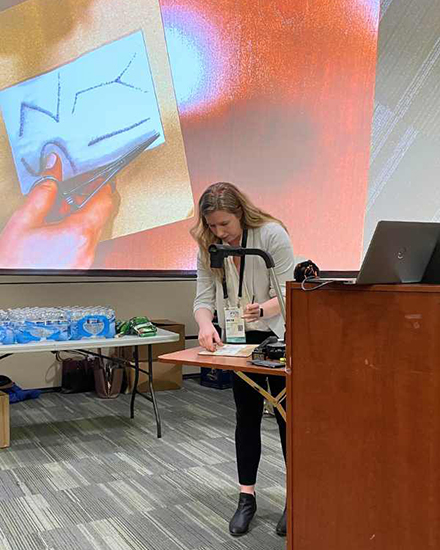 Students watch sutchering demonstrations and follow along with Barry University podiatrists. (Photo by Alessandra Silva-Casanova)