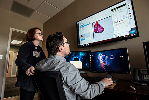 Summer Decker and Jonathan Ford from the USF Health Department of Radiology make a 3D model of a heart