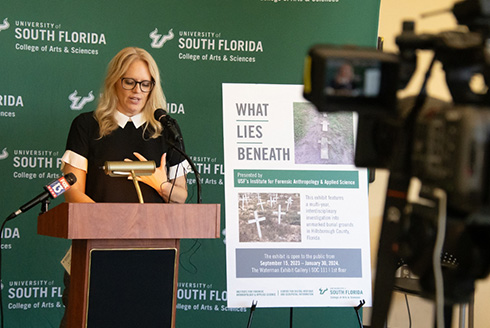 Associate Professor Erin Kimmerle speaks to media at the